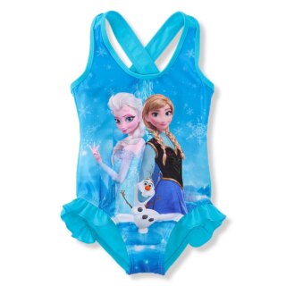 Sur fond blanc, on voit un maillot de bain reine des neiges bleu à l'effigie d'elsa, anna et Olaf. les bretelles sont croisées dans le dos.
