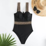 Maillot de bain sculptant noir avec détails dorés femme